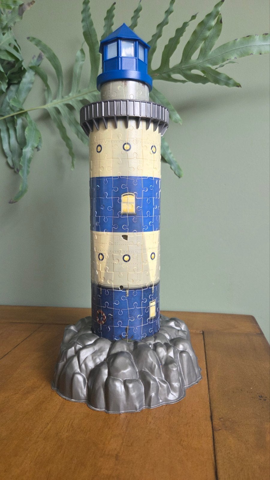 Foto 2 van Ravensburger 3D Puzzel Vuurtoren met Licht (216 stukjes)