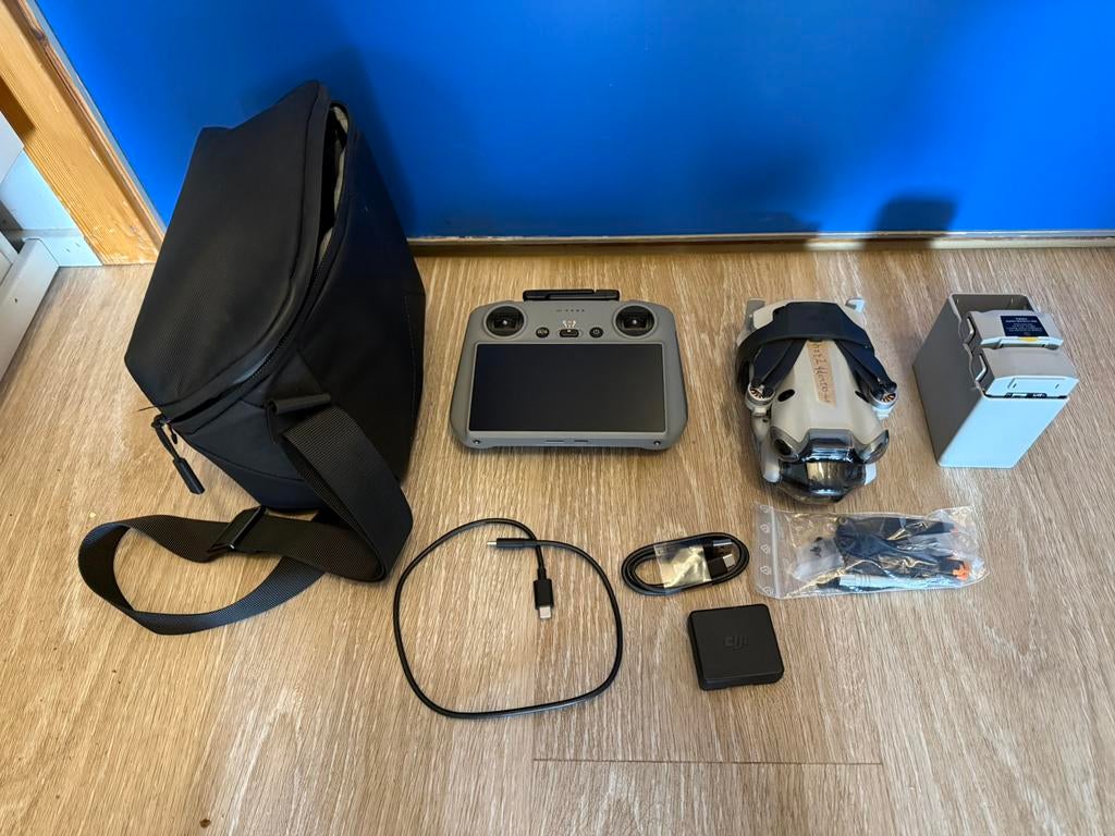 DJI Mini 4 PRO fly more met dji care en wide lens, Ophalen of Verzenden, Zo goed als nieuw