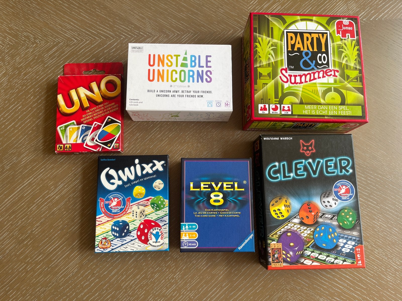 Bordspellen: UNO, Qwixx, Unstable Unicorns, Level8, Party Co, Vijf spelers of meer, Ophalen of Verzenden, Zo goed als nieuw