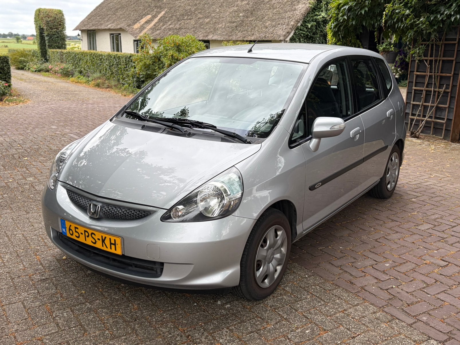 Honda Jazz 1.4 I  airco  / Trekhaak, Auto's, Honda, Voorwielaandrijving, 83 pk, 40 €/maand, 4 cilinders