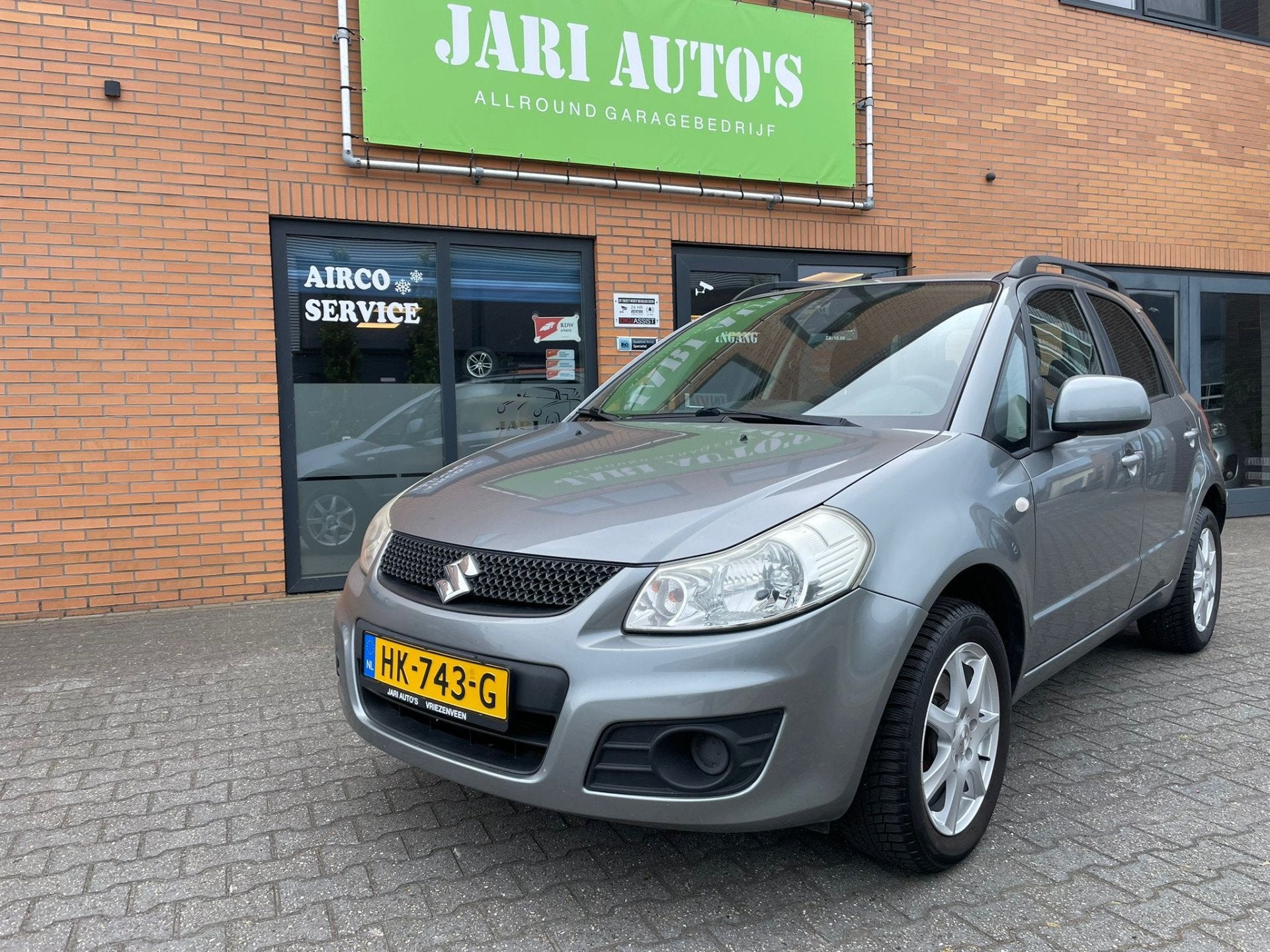 Suzuki SX4 1.6 Comfort Airco, weinig km (bj 2010)