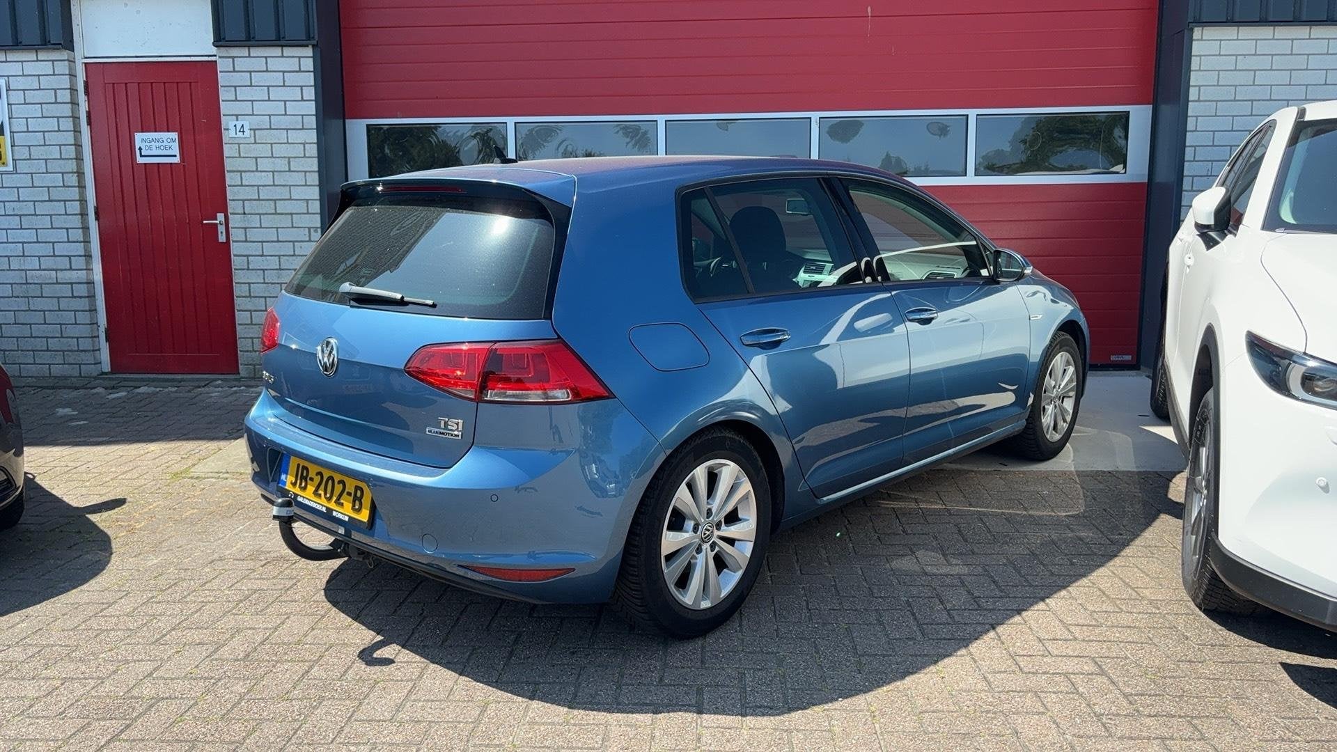 Volkswagen Golf 1.0 TSI Business Edition Connected TREKHAAK, Voorwielaandrijving, Stof, Gebruikt, Blauw