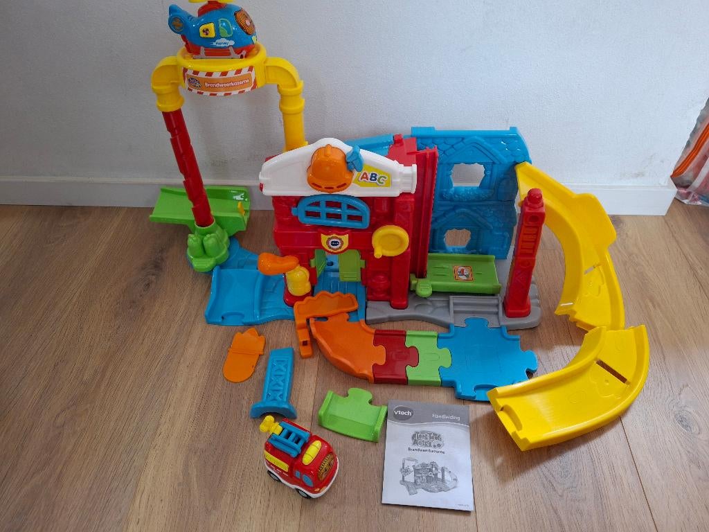 V Tech Toet Toet auto brandweer garage, Kinderen en Baby's, Speelgoed | Vtech, Ophalen, Gebruikt, 2 tot 4 jaar