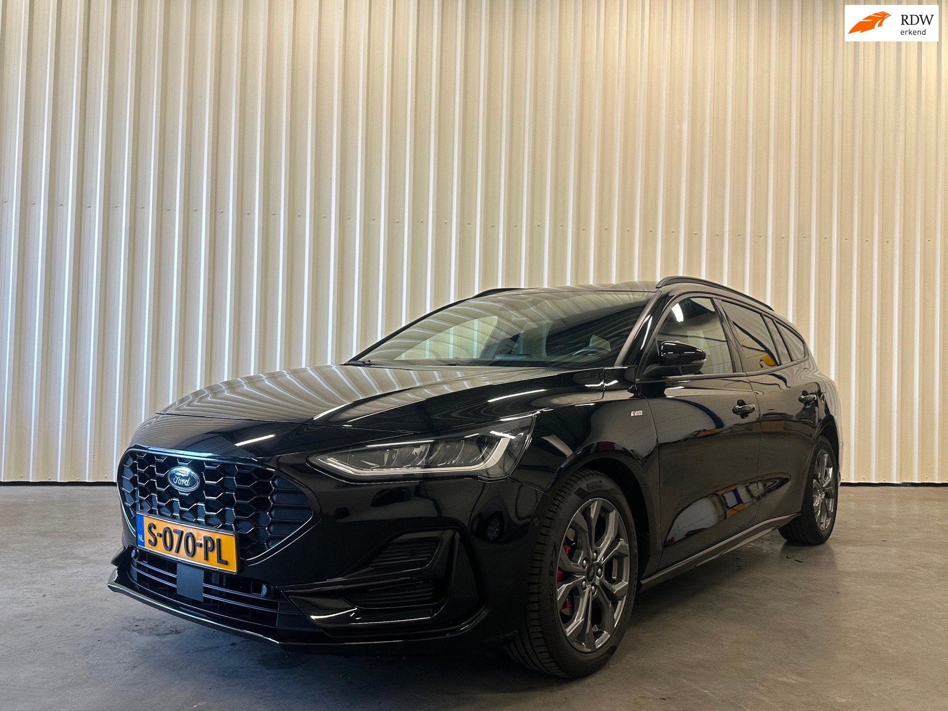 Ford Focus Wagon 1.0 EcoBoost Hybrid ST Line Style, Auto's, Gebruikt, Zwart, Origineel Nederlands, Handgeschakeld