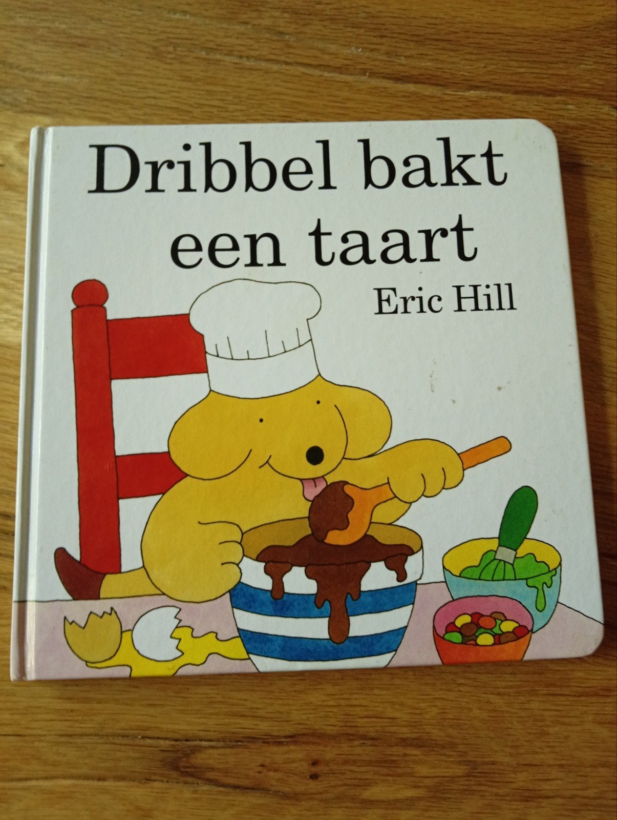 Dribbel bakt een taart - Eric Hill (kartonboek), Ophalen of Verzenden