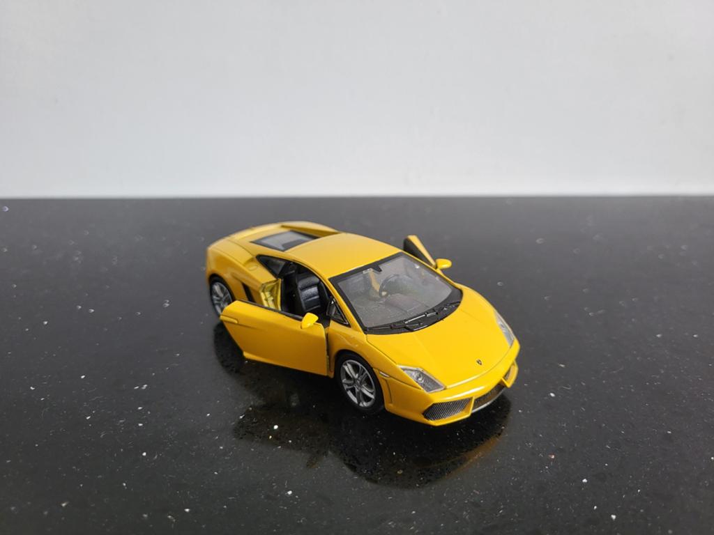 Lamborghini Gallardo LP560-4 geel 1/43 Welly, Ophalen of Verzenden, Zo goed als nieuw, Auto, Overige merken