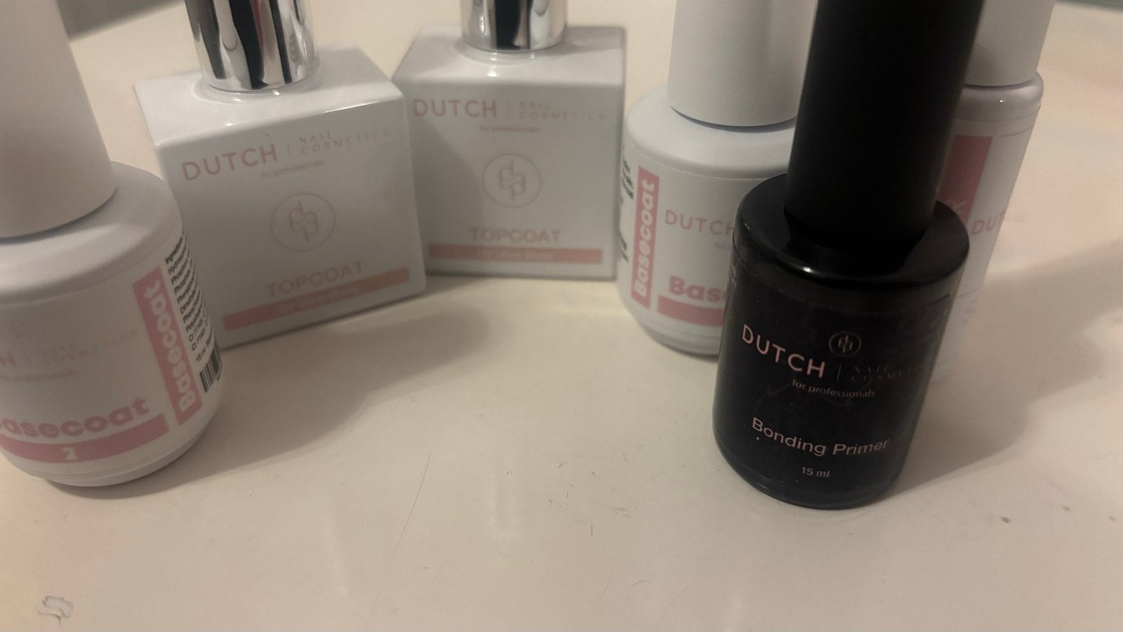 Dutch Nail Cosmetics Basecoat, Topcoat en Bonding Primer, Sieraden, Tassen en Uiterlijk, Wit, Nieuw, Ophalen of Verzenden, Handen en Nagels