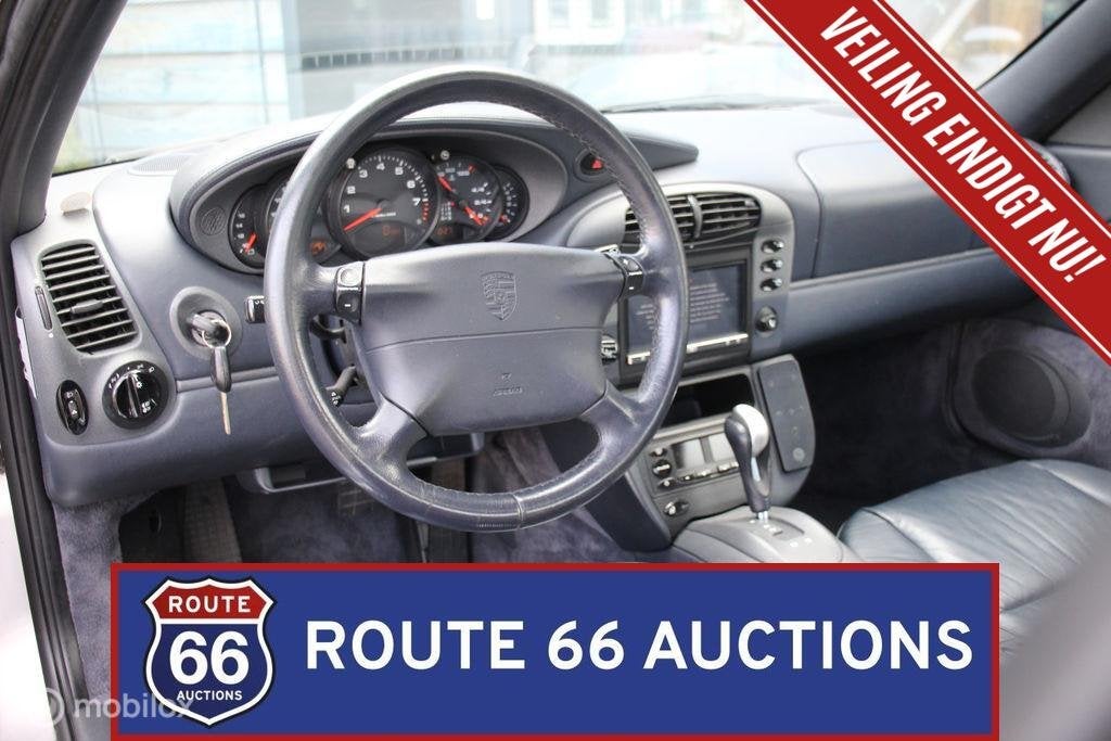 Porsche 911 Carrera | 1998 | Route 66 Auctions, Auto's, Oldtimers, Overige carrosserieën, Zwart, Bedrijf, Porsche