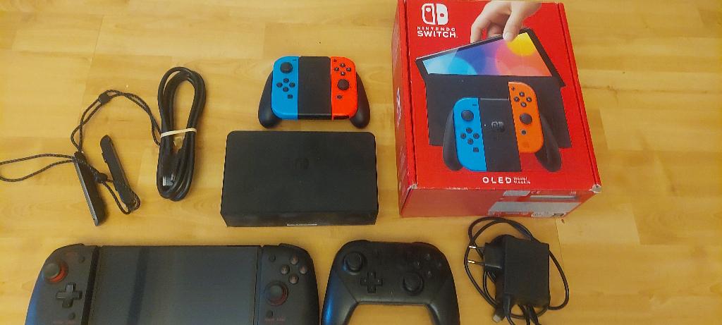 Nintendo Switch (OLED model) Blauw, Rood, Switch OLED, Met games, Ophalen of Verzenden, Zo goed als nieuw