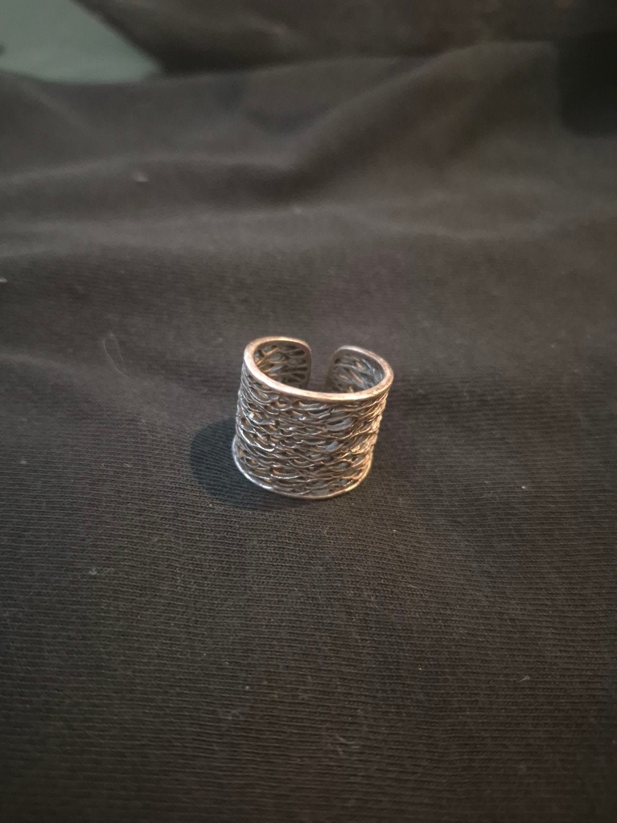Verstelbare zilverkleurige ring met open design, Gebruikt, Ophalen of Verzenden, Dame of Heer, Zilver