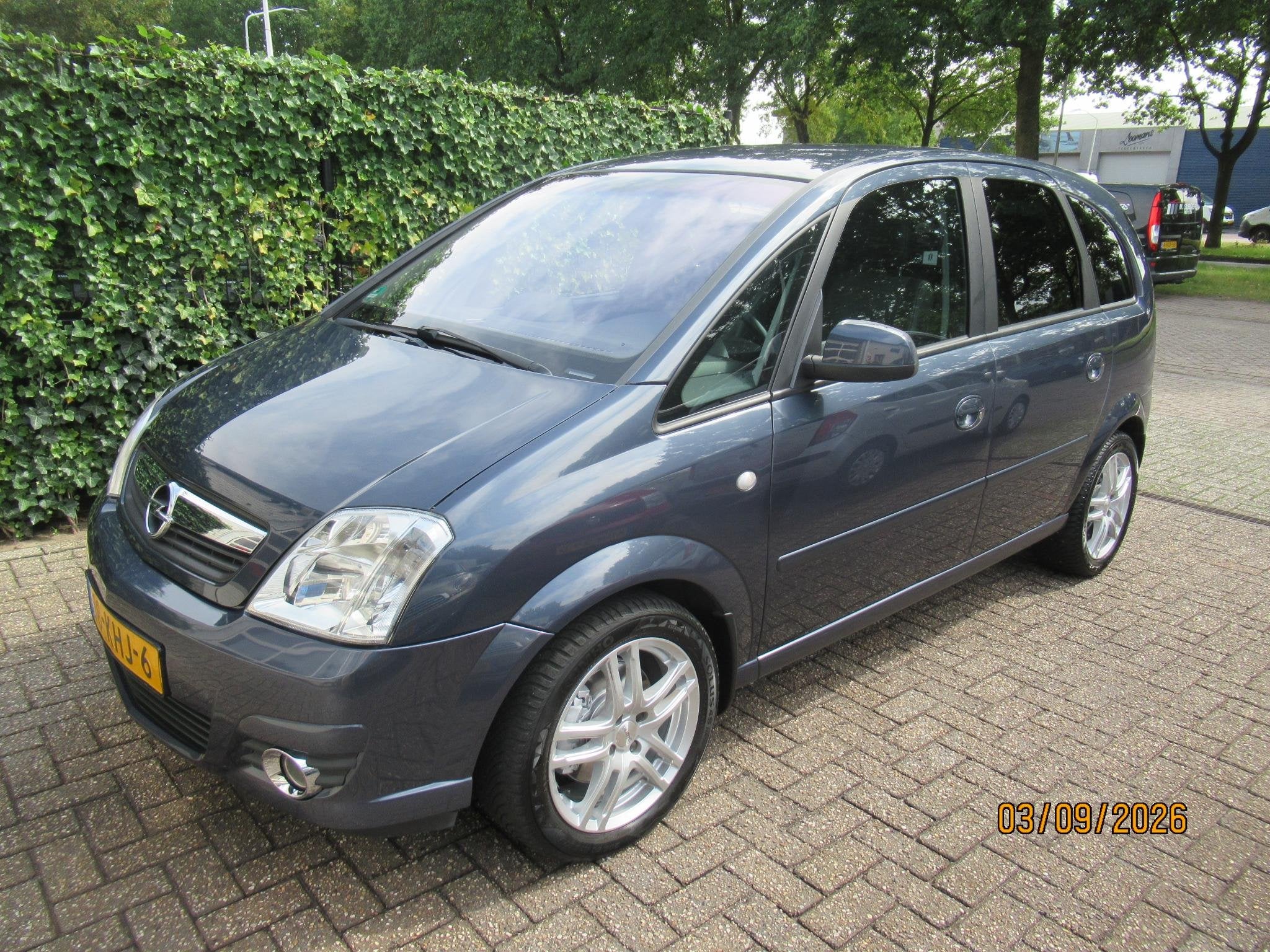 Opel Meriva 1.6-16V Cosmo automaat, Auto's, 15 km/l, Gebruikt, 4 cilinders, Leder en Stof