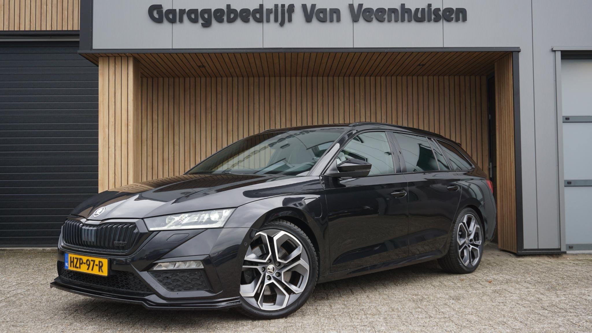 Skoda Octavia Combi 1.4 TSI 245pk RS iV PHEV Pano.Dak HUD Ca, Auto's, Gebruikt, 4 cilinders, Zwart, Hybride Elektrisch/Benzine