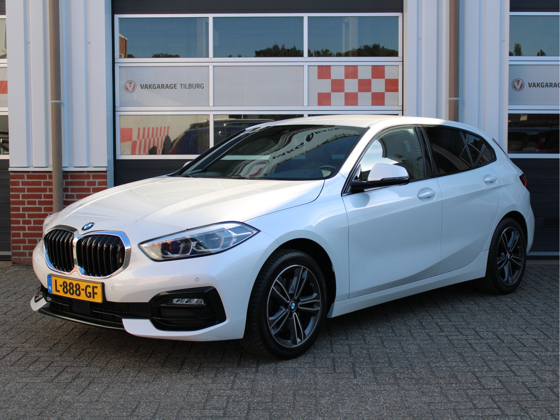 BMW 1-serie 118i Business Edition Sport Automaat Stoelverw/H, Auto's, 136 pk, Gebruikt, Verwarmde buitenspiegels, Leder en Stof