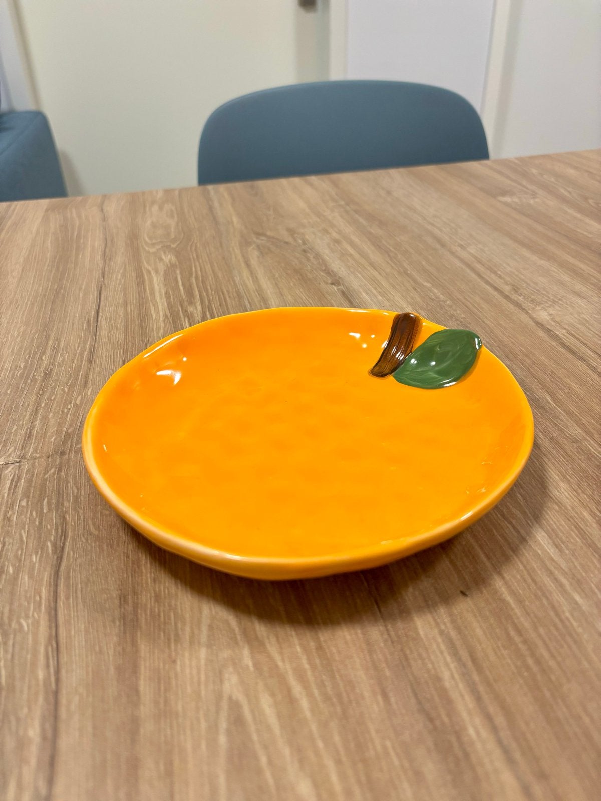 Oranje schaaltje met blad en takje decoratie, Overige merken, Keramiek, Ophalen of Verzenden, Modern