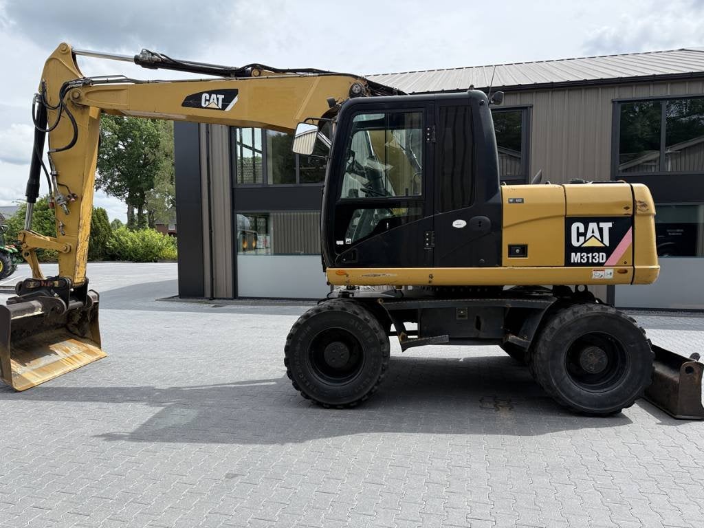 Cat M 313 D (bj 2010), Graafmachine