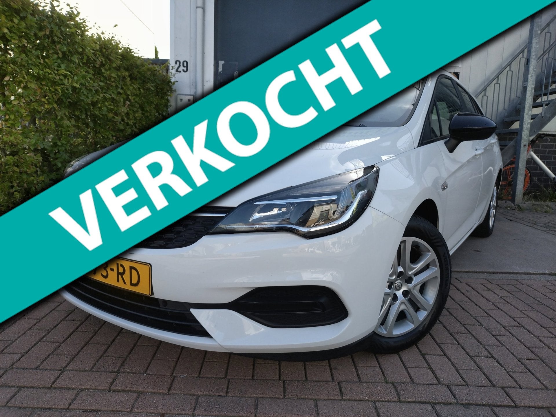 Opel Astra Sports Tourer 1.2 Edition rijklaar, Stof, Gebruikt, 1199 cc, Wit