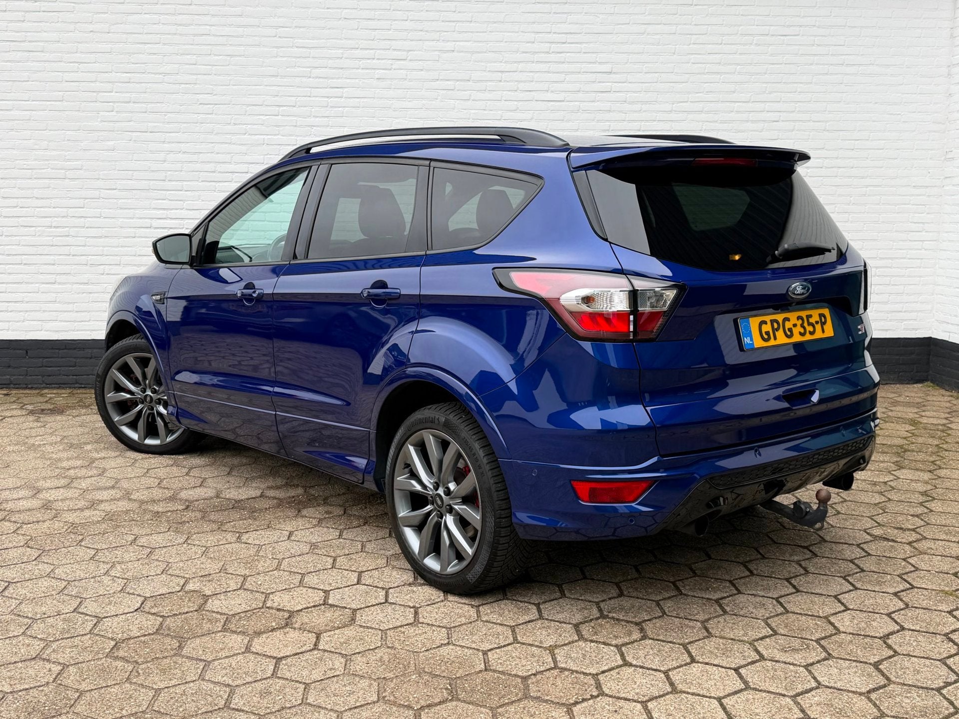 Ford KUGA 1.5 ST-Line 4WD 182PK AUTOMAAT l TREKHAAK l CAMERA, Auto's, Automaat, 4 cilinders, 1850 kg, Blauw
