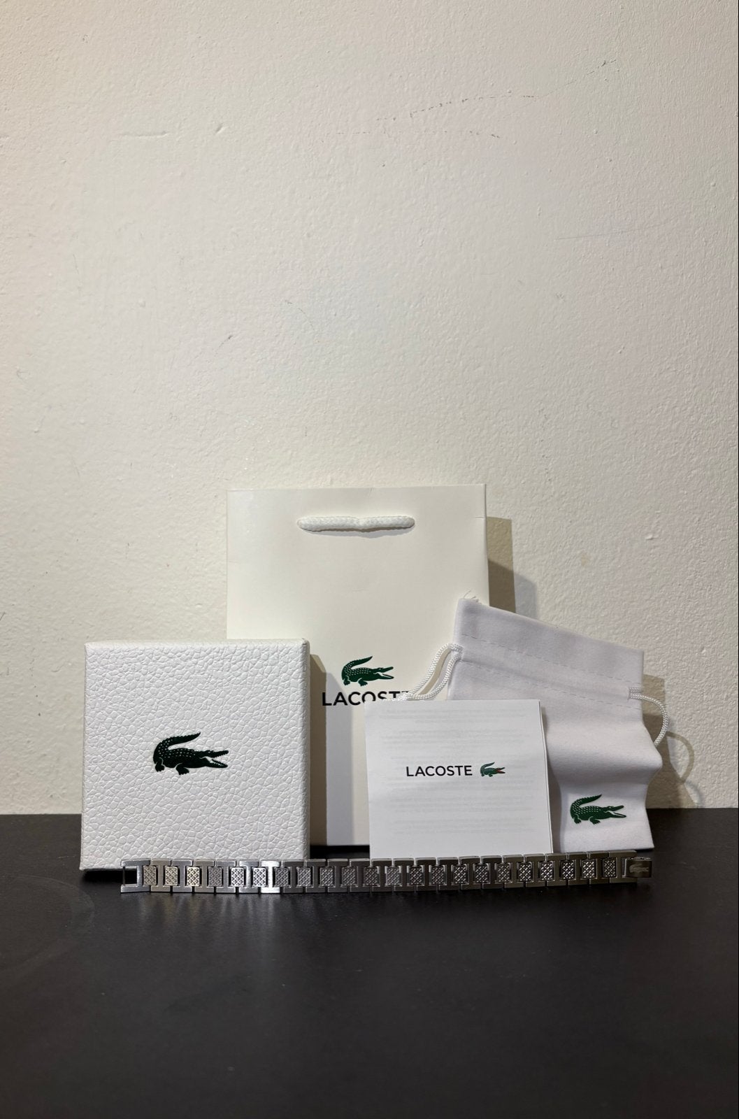 Lacoste Armband - Zilverkleurig met Krokodil Logo, Ophalen of Verzenden, Zo goed als nieuw, Zilver, Staal