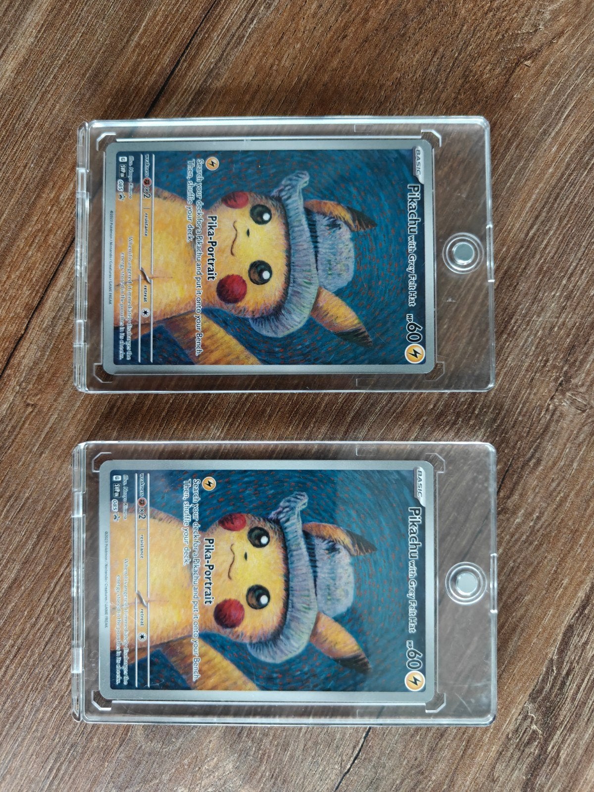 Pikachu met grijze muts (Pika-Portrait) - 2 kaarten, Ophalen of Verzenden, Zo goed als nieuw, Meerdere kaarten