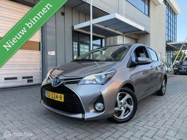 Toyota Yaris 1.5 Hybrid Comfort Full option Camera Automaat, Auto's, Toyota, Gebruikt, Euro 6, 4 cilinders, Bruin