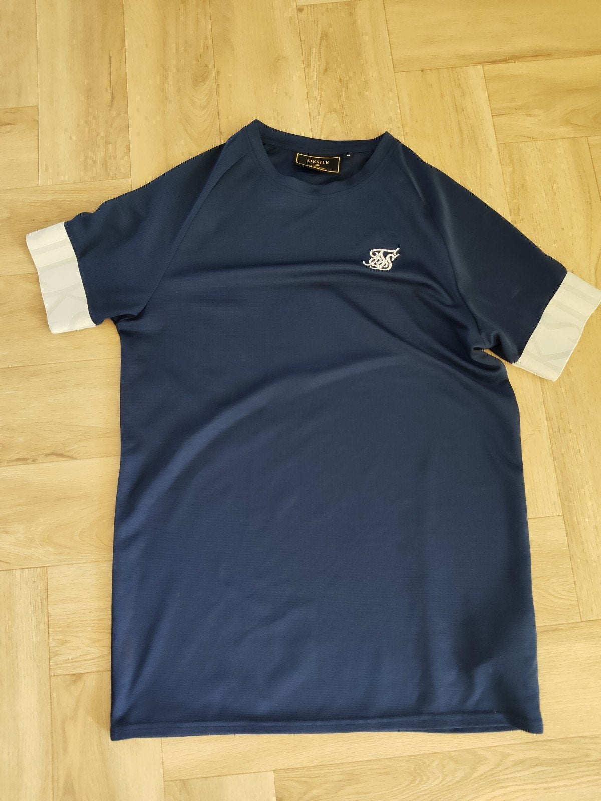 SikSilk T-shirt - Donkerblauw met wit detail, SikSilk, Ophalen of Verzenden, Zo goed als nieuw, Maat 48/50 (M)