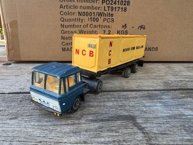 1:50 Daf Trailer oplegger met container Lion Car, Ophalen of Verzenden, Gebruikt, Bus of Vrachtwagen, Lion Toys