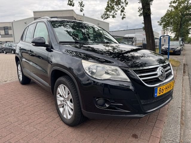 Volkswagen Tiguan 1.4 TSI 150pk Sport&Style Airco/ECC,Cruise, Auto's, Volkswagen, Euro 5, Stof, Zwart, 4 cilinders