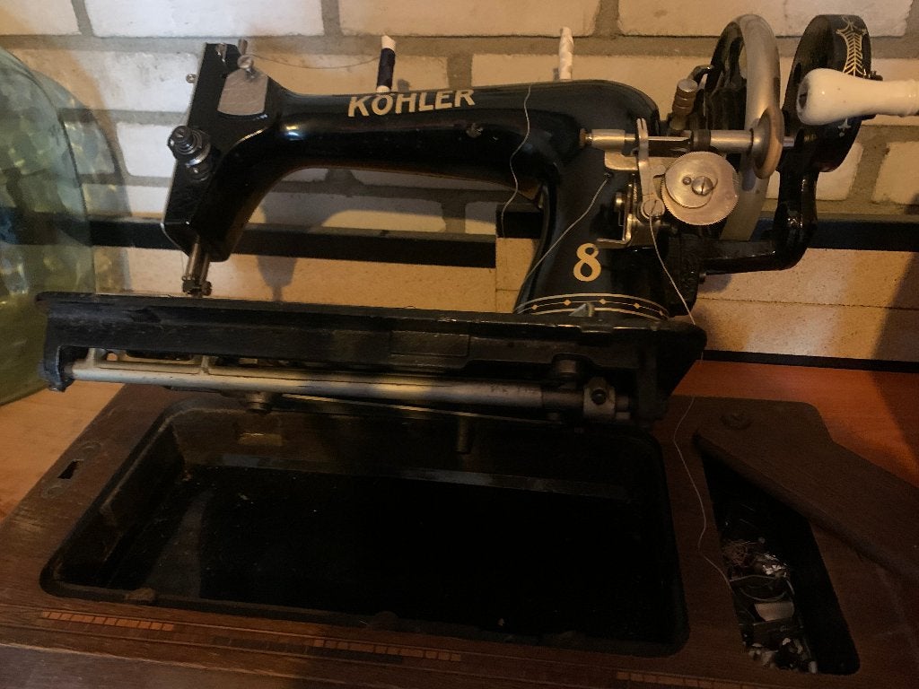 Oude naaimachine Kohler, Ophalen