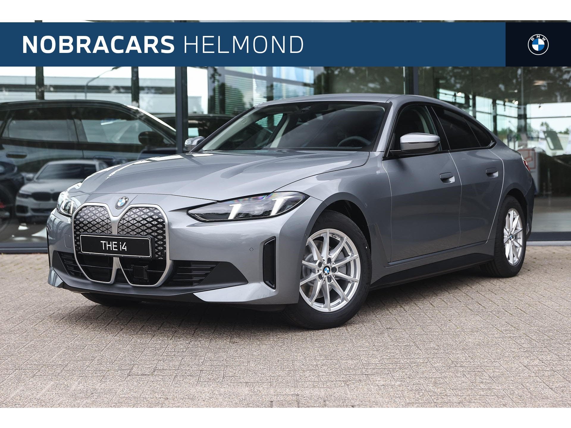 BMW i4 eDrive40 Pure edition / Achteruitrijcamera / Comfort, Auto's, Dealer onderhouden, Achterwielaandrijving, Zwart, 2020 kg