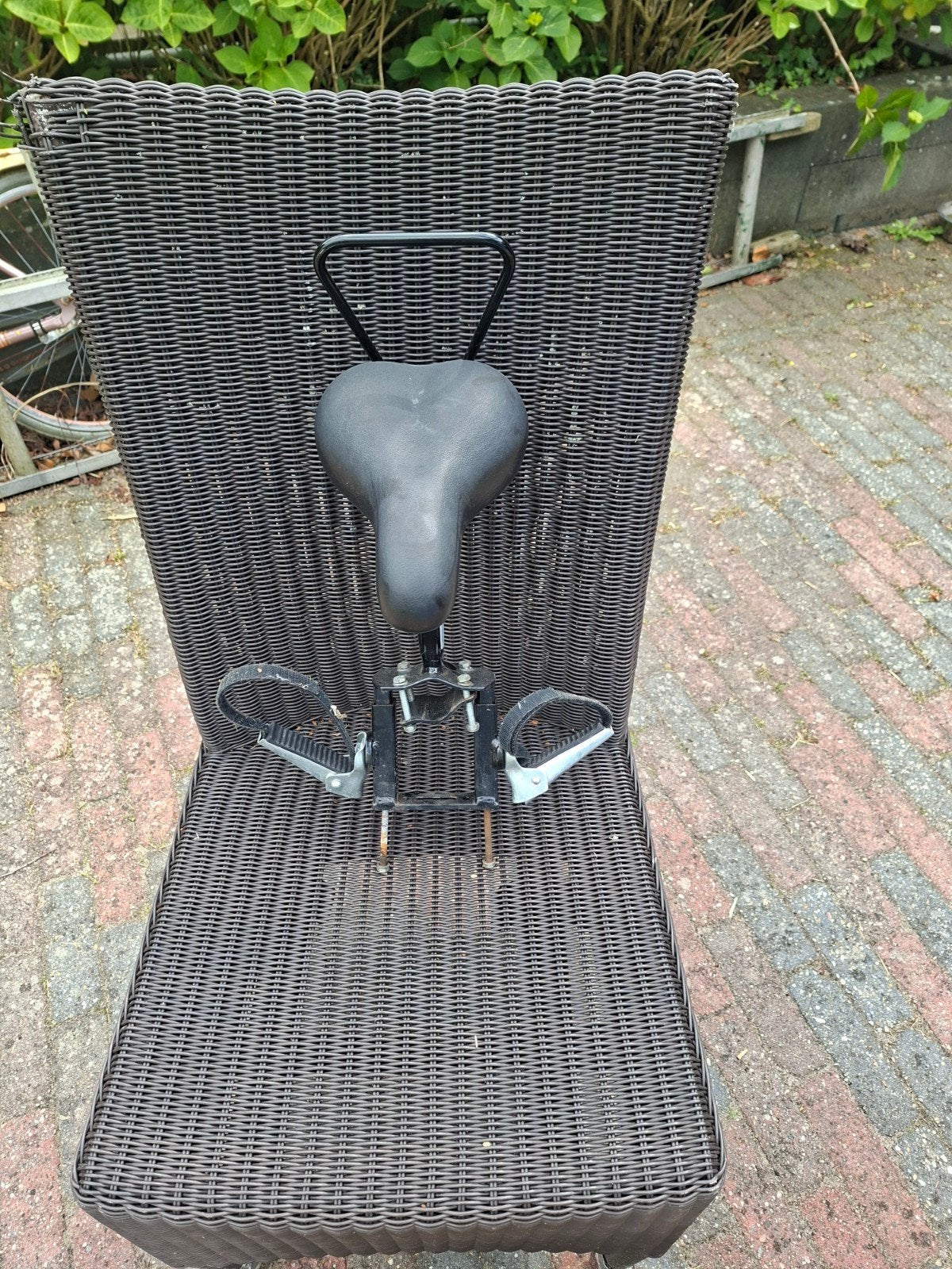 Zadel voor op de stang., Ophalen