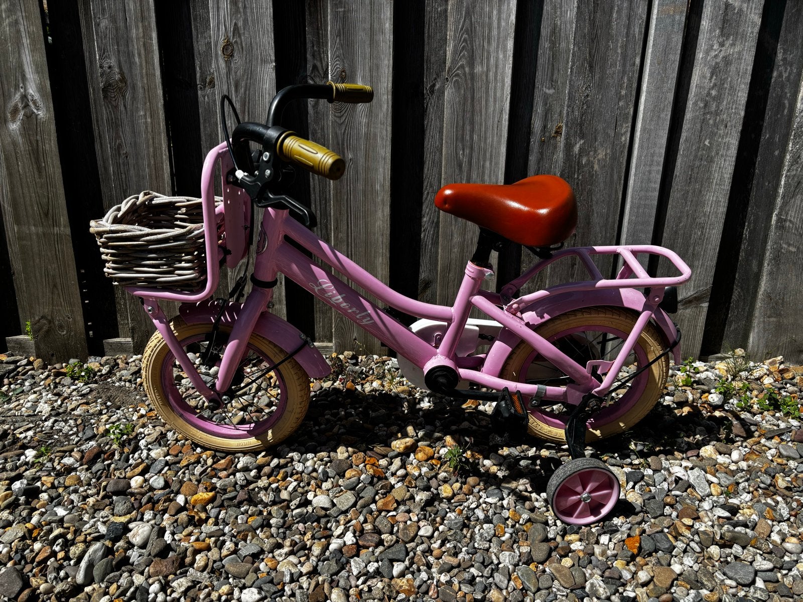 Roze kinderfiets Liberty Spirit 12 inch met zijwieltjes, Ophalen, Zijwieltjes, Gebruikt, Velgrem