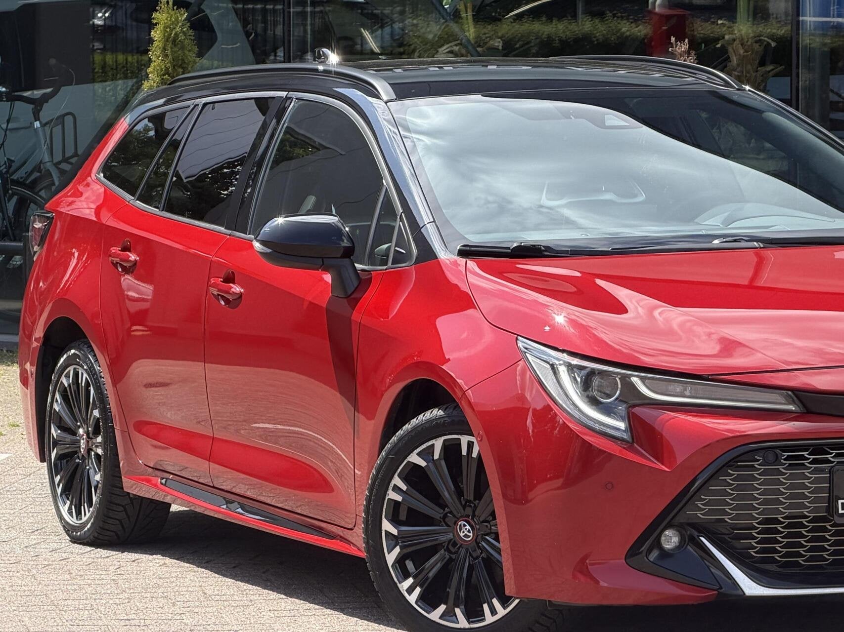 Toyota Corolla Touring Sports 1.8 Hybrid GR-Sport, Auto's, Toyota, 1345 kg, Gebruikt, Zwart, 4 cilinders