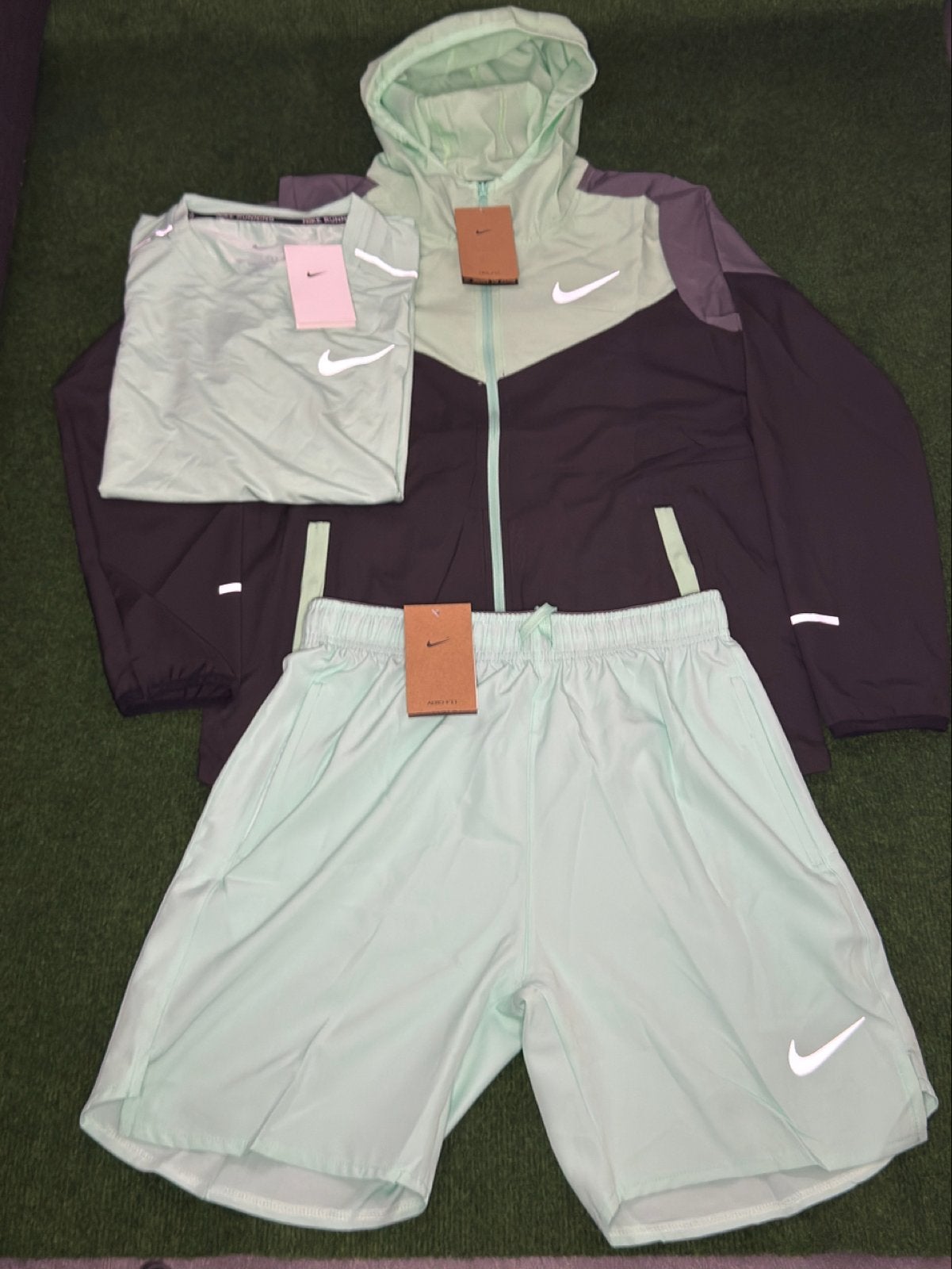 Nike Miller Lichtblauw Trainingspak - Jas, Shirt & Short, Nieuw, Ophalen of Verzenden, Algemeen, Maat 48/50 (M)