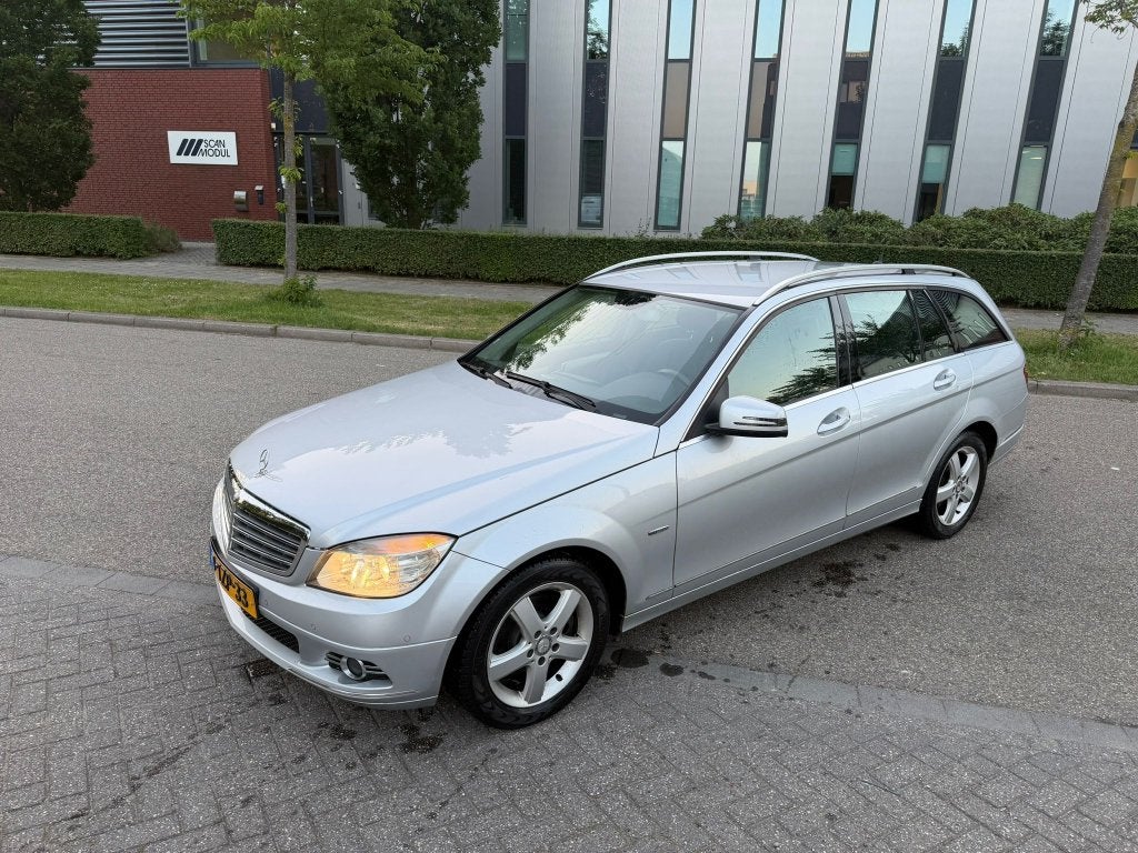 Mercedes-Benz C-Klasse  C180 Kompr. Estate AUT 2009 Grijs, Achterwielaandrijving, 1800 kg, Zwart, Particulier