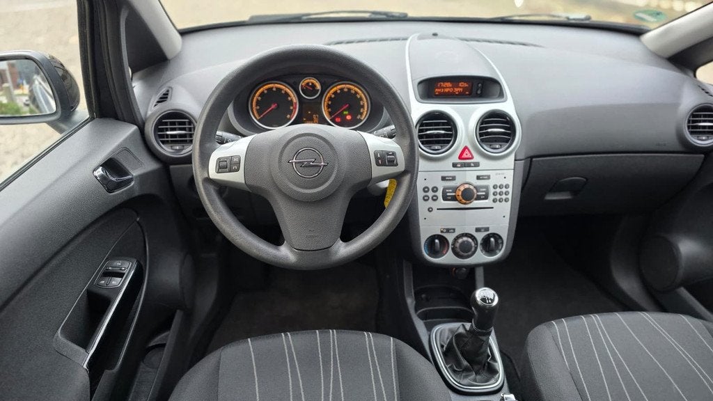 Opel Corsa 1.4-16V Sport uitvoering in nette staat, Voorwielaandrijving, Gebruikt, Zwart, 4 cilinders