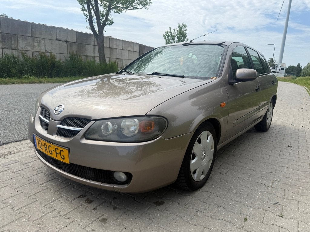 Nissan Almera 1.8 Acenta met airco zie omschrijving, Auto's, Nissan, Gebruikt, 4 cilinders, Bruin, 116 pk
