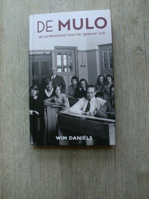 Wim Daniëls - De MULO de carrièreschool voor het gewone volk, Ophalen of Verzenden, Zo goed als nieuw