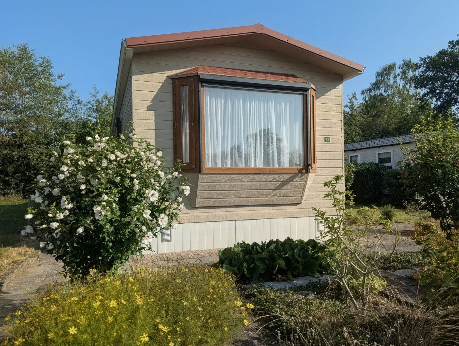 Canexel chalet met staanplaats, 10 x 3,60 m, Tot en met 2