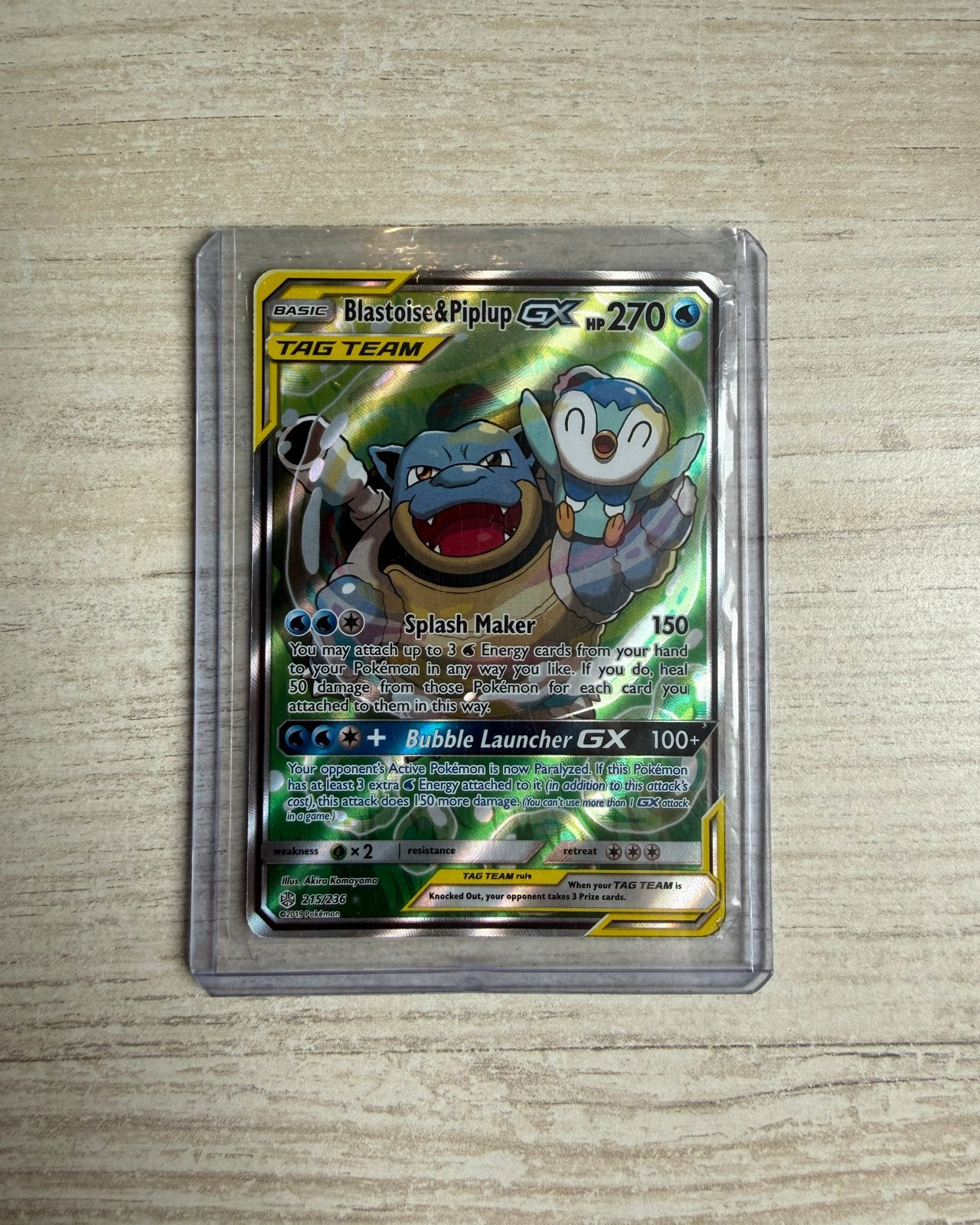 Blastoise & Piplup GX TAG TEAM Pokémon Kaart (215/236), Ophalen of Verzenden, Zo goed als nieuw, Losse kaart, Foil