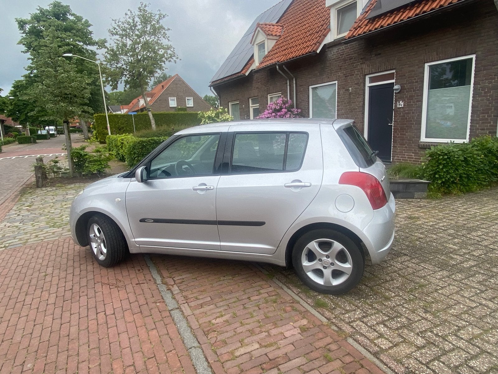 Suzuki Swift 1.3 5D AUT 2006 Grijs, Auto's, Suzuki, Stof, 40 €/maand, Zwart, 400 kg