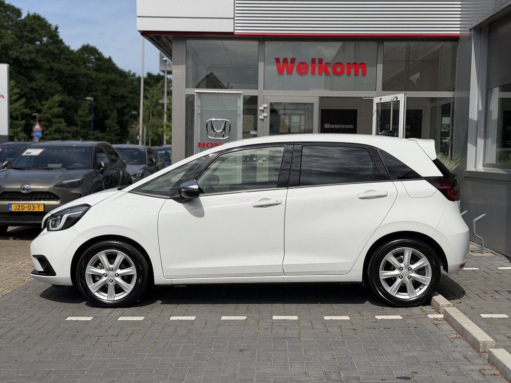Honda Jazz 1.5 e:HEV Executive | GEEN AFLEVERKOSTEN | Dodeho, Auto's, Honda, 12 maanden, 4 cilinders, Leder en Stof, Wit