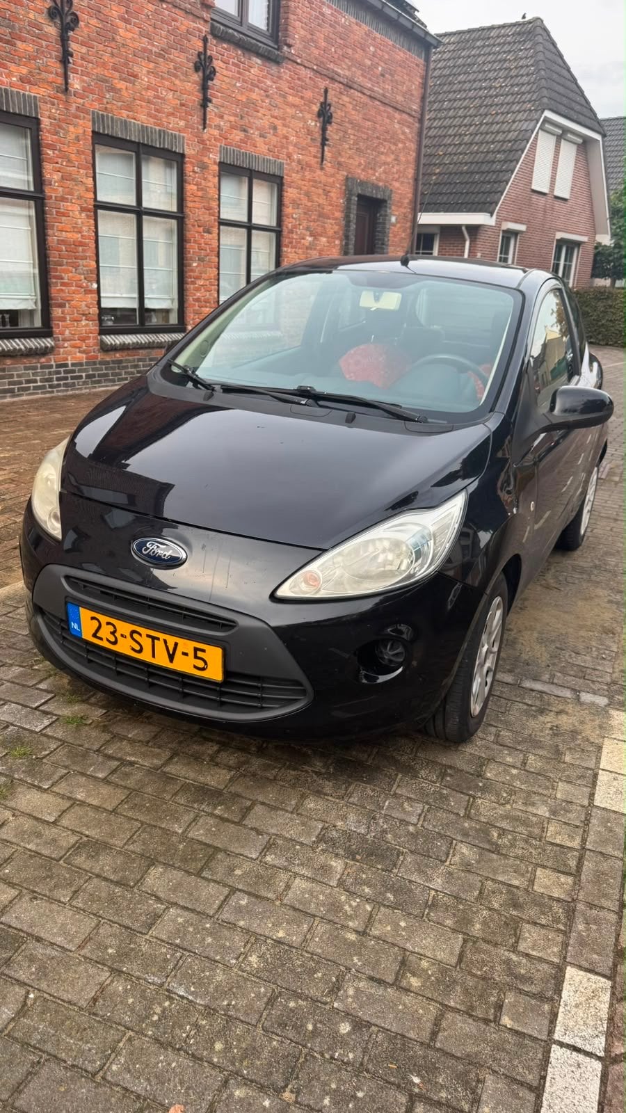 Ford Ka 1.2 69pk 2011 Zwart, Auto's, Voorwielaandrijving, Stof, 4 cilinders, 4 stoelen