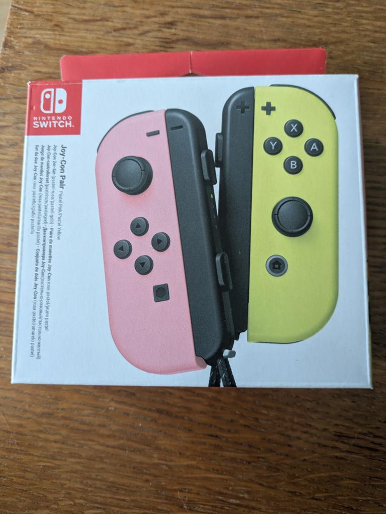 Nintendo Switch Joy-Con-paar - Roze & Geel, Spelcomputers en Games, Spelcomputers | Nintendo Switch, Ophalen of Verzenden, Zo goed als nieuw