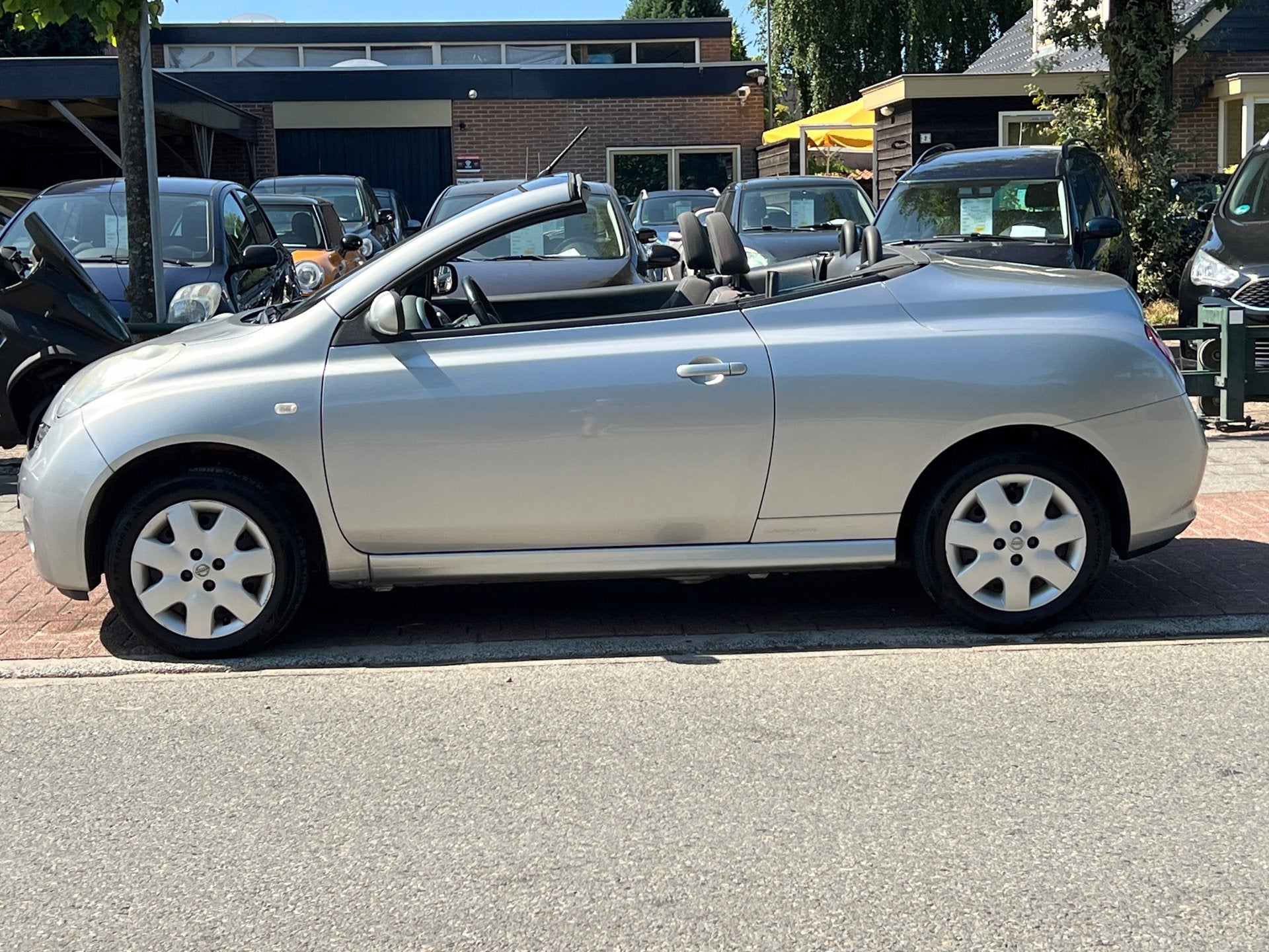 Nissan Micra C+C 1.4 Tekna *CABRIO| APK 07-2027, Auto's, Nissan, Voorwielaandrijving, Gebruikt, 750 kg, 4 cilinders