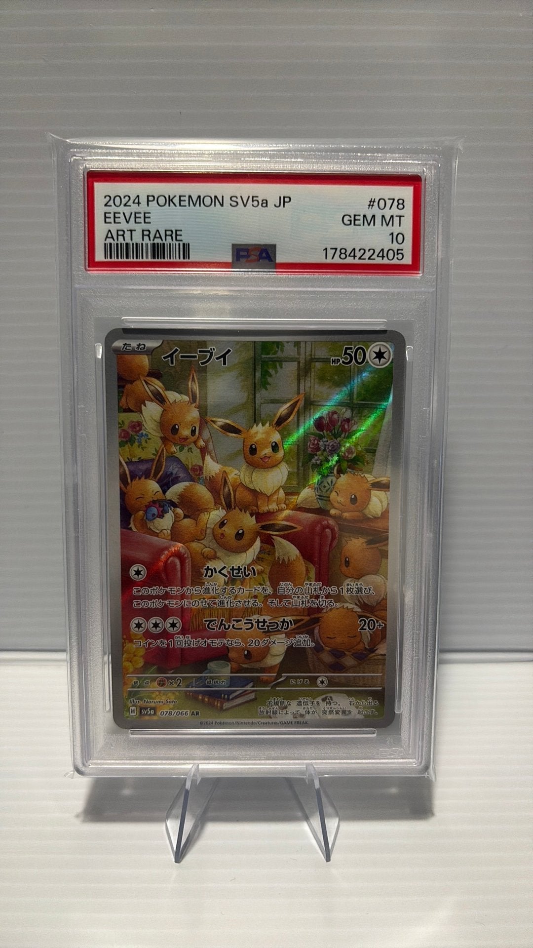 Eevee 078/066 Japanse Crimson Haze PSA 10, Ophalen of Verzenden, Zo goed als nieuw, Losse kaart