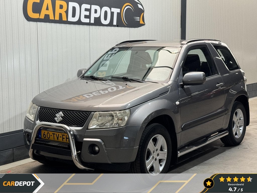 Suzuki Grand Vitara 1.6-16V Exclusive, Auto's, Suzuki, 1345 kg, Stof, Gebruikt, 4 cilinders