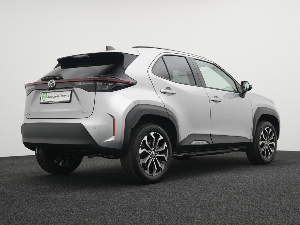 Toyota Yaris Cross 1.5 Hybrid 130 Executive | Camera | Priva, Auto's, Stof, Gebruikt, 750 kg, Grijs