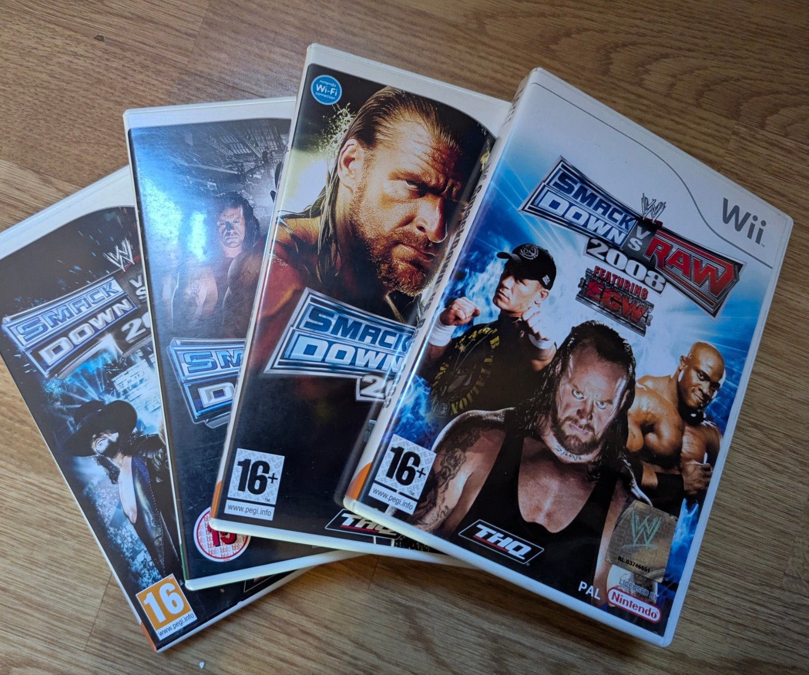 4 x WWE SmackDown vs Raw compleet, Vechten, Ophalen of Verzenden, Zo goed als nieuw, 3 spelers of meer