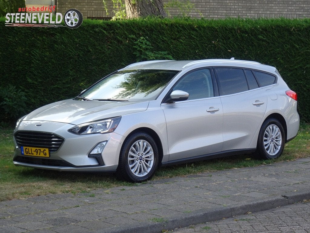 Ford FOCUS Wagon 1.0 125pk Hybrid Titanium met Navi, Camera, Stof, Gebruikt, Euro 6, Automatische klimaatregeling