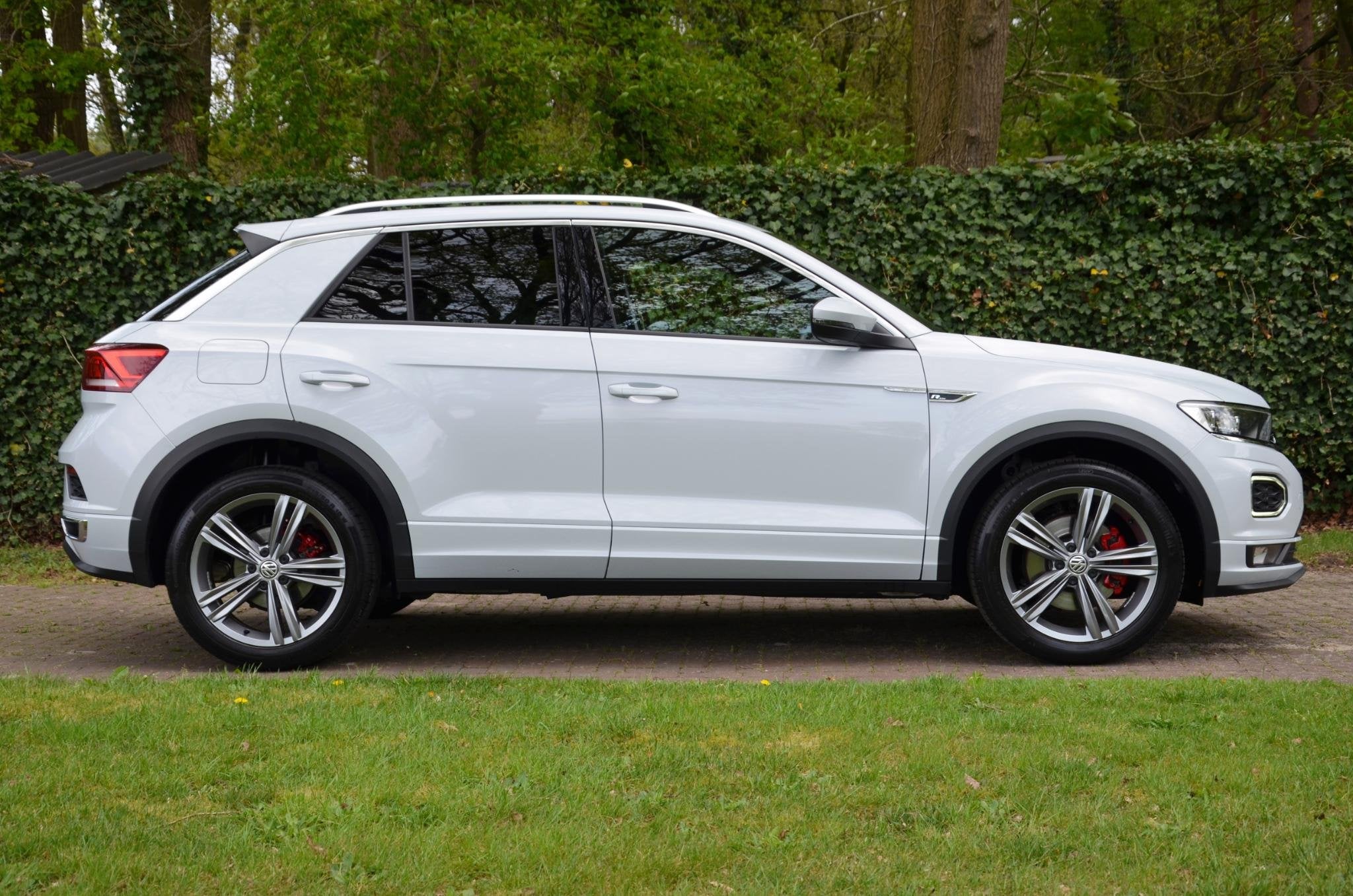 Volkswagen T-Roc 1.5 TSI Sport Business R Line Automaat/Navi, Auto's, Volkswagen, Stof, 4 cilinders, 150 pk, Automatische klimaatregeling